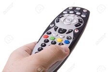 4664430-Hand-holding-a-tv-remote-control-Focus-on-the-RGYB-buttons--Stock-Photo.jpg