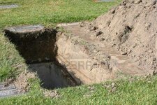 3087266-grave-already-dug-waiting-for-a-body-to-be-buried-in-it.jpg
